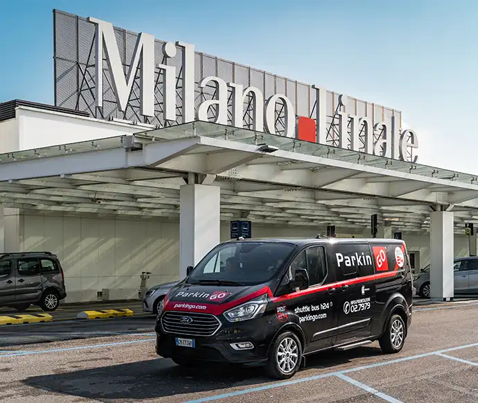 ParkinGO shuttle waiting in front of the terminal at Milan Linate Airport